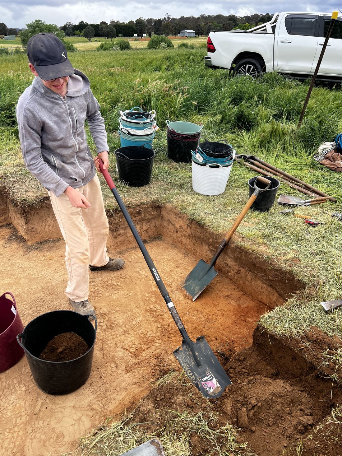 COLCO archaeological test excavation underway in the field, capital region